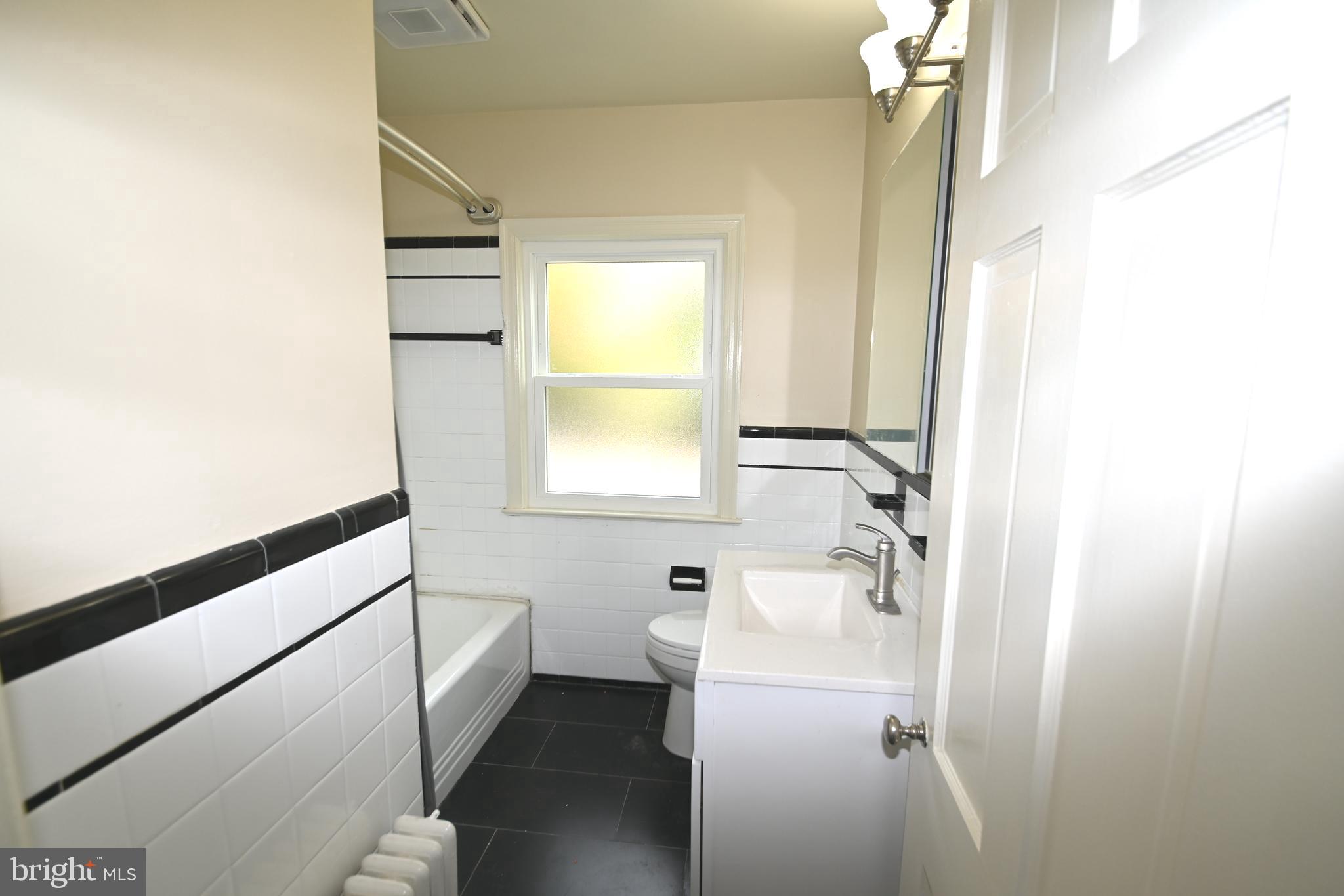 8904 Flower Avenue Silver Spring, MD 20901 - Photo 8 of 12 Tile Bath