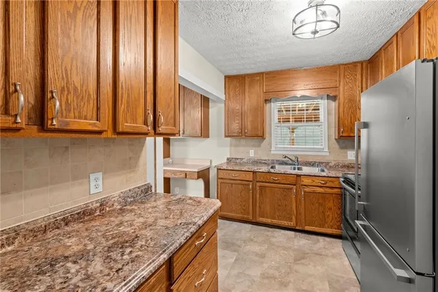 an entryway door view of a kitchen