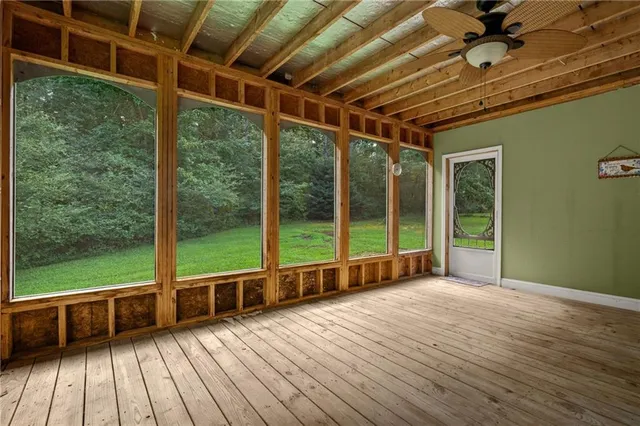 a bathroom with a tub and shower