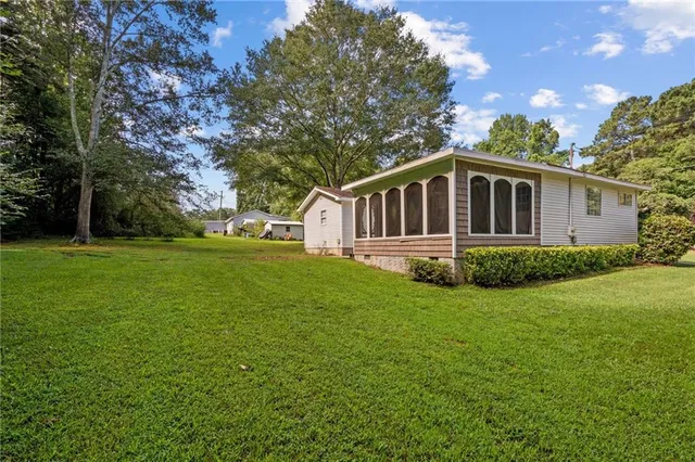 a house with garden in front of it