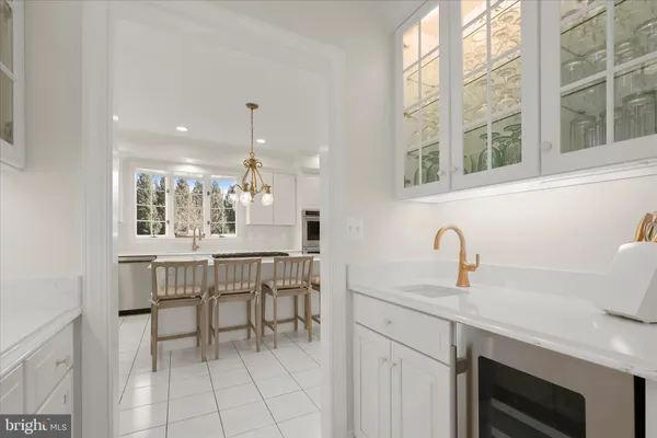 a bathroom with a toilet sink and shower