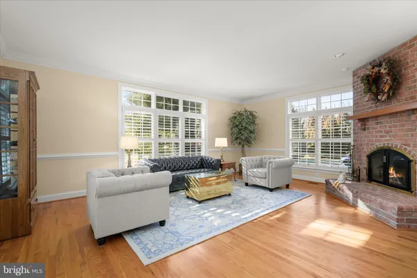 a kitchen with stainless steel appliances granite countertop a sink and a microwave