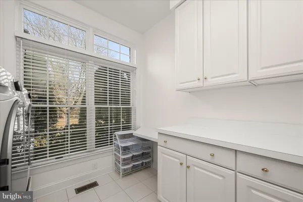 an aerial view of a house with yard swimming pool and outdoor seating