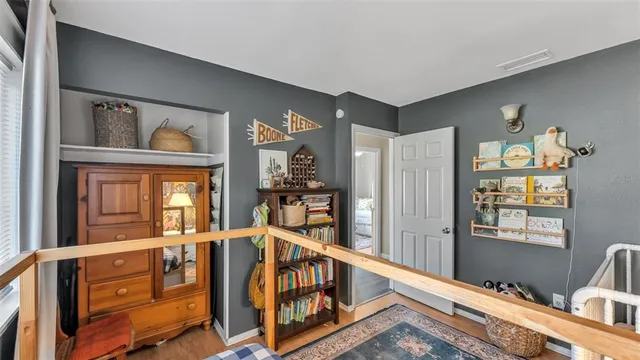 a view of a hallway with windows