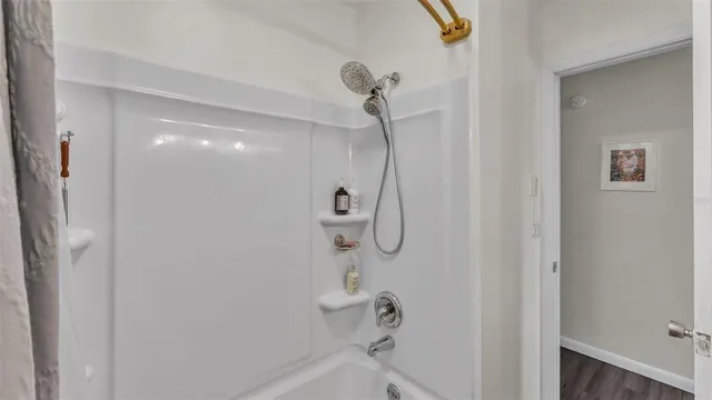 a utility room with dryer washer and other items