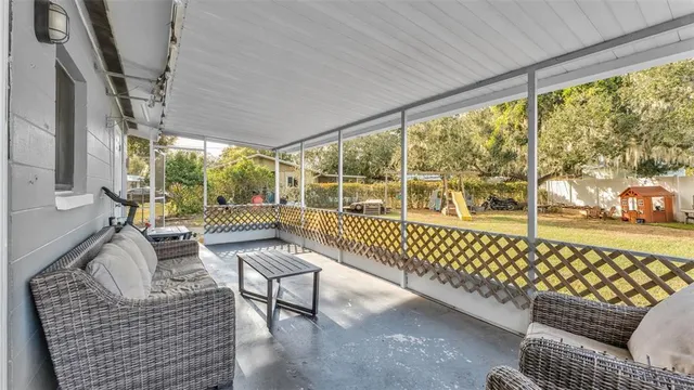 a view of a house with backyard