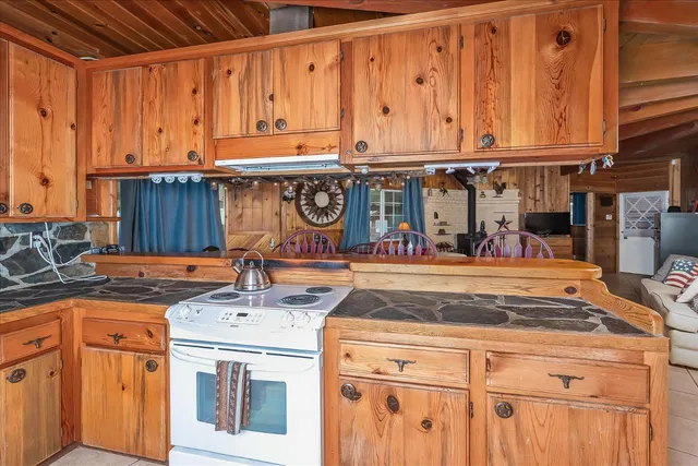 a kitchen sink with a stove