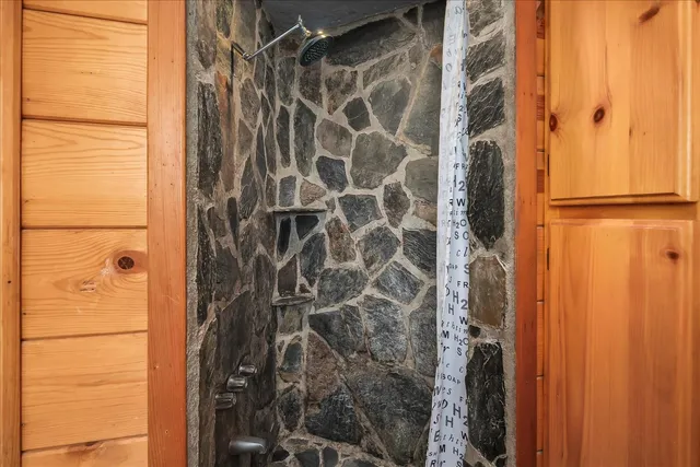 a view of a balcony with furniture