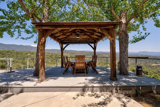 swimming pool view with a seating space