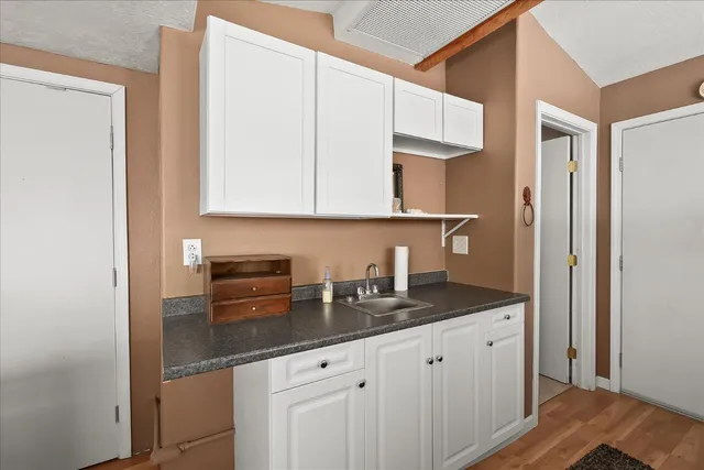 an aerial view of a house having yard