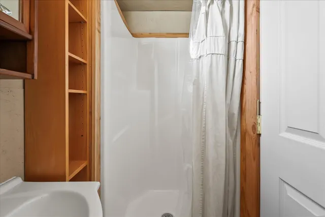 a bathroom with a toilet and a sink