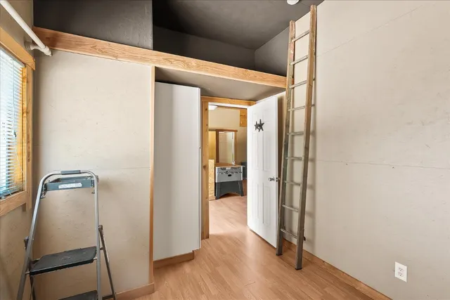 a view of a yard with a tree