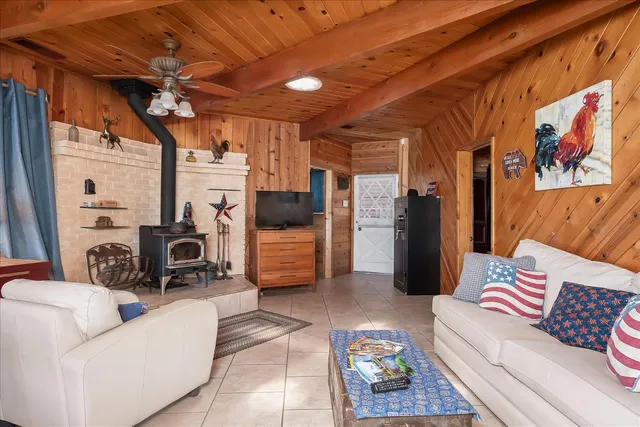 a view of a dining table and chairs in the patio