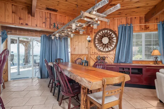 a view of an outdoor space with a table and chairs
