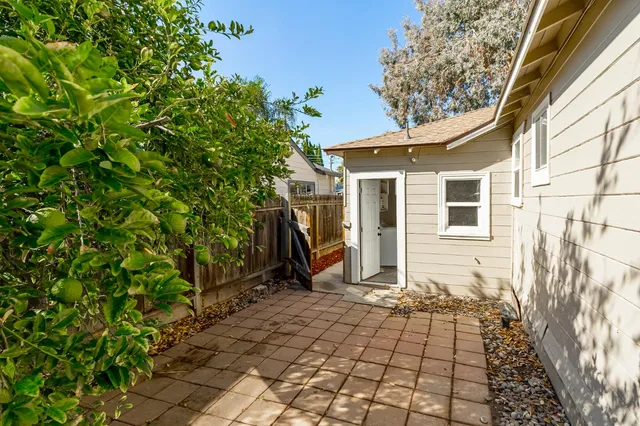 a view of a back yard of the house