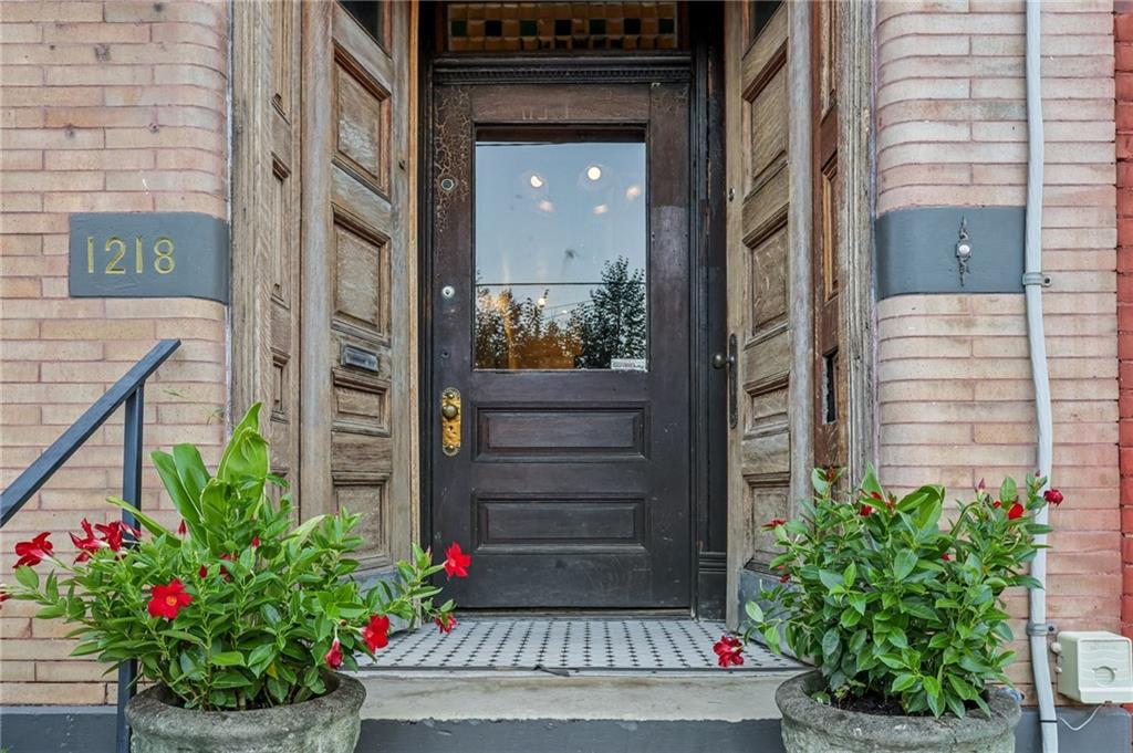 1218 Sherman Avenue Pittsburgh, PA 15212 - Photo 8 of 48 a flower plants in front of a building