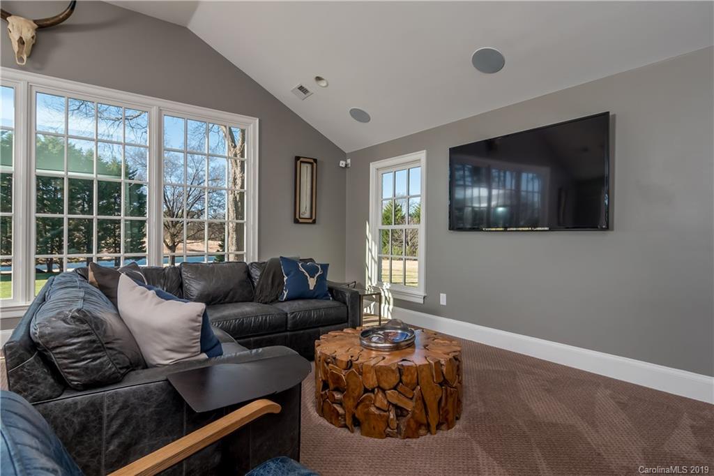 2634 Sharon Road Charlotte, NC 28211 - Photo 17 of 46 a living room with furniture and a flat screen tv