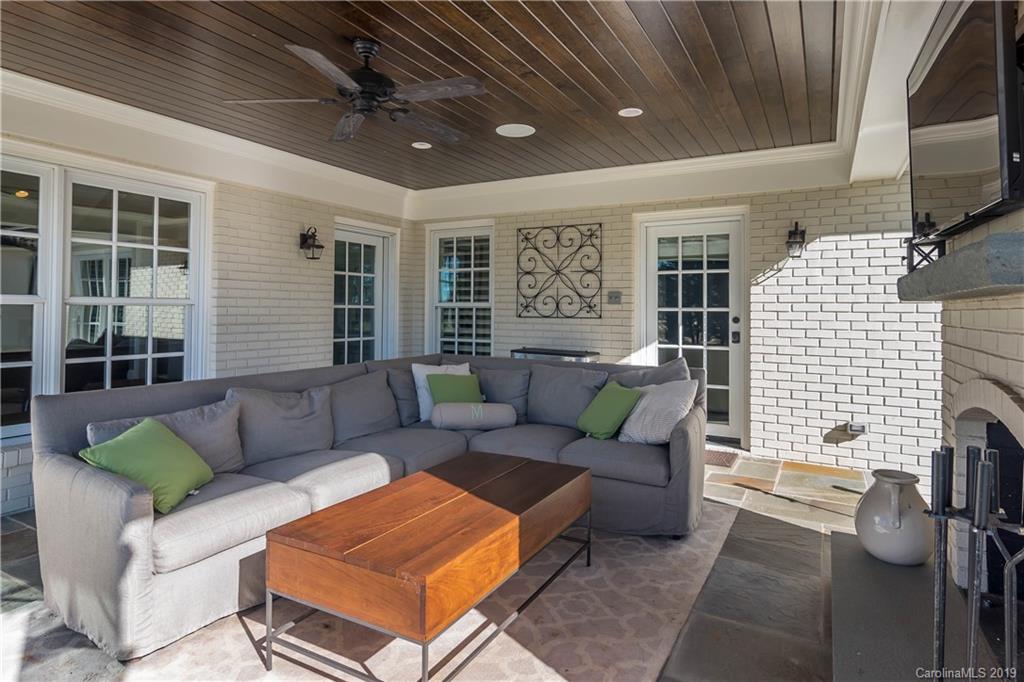 2634 Sharon Road Charlotte, NC 28211 - Photo 40 of 46 a outdoor living space with furniture and a fireplace