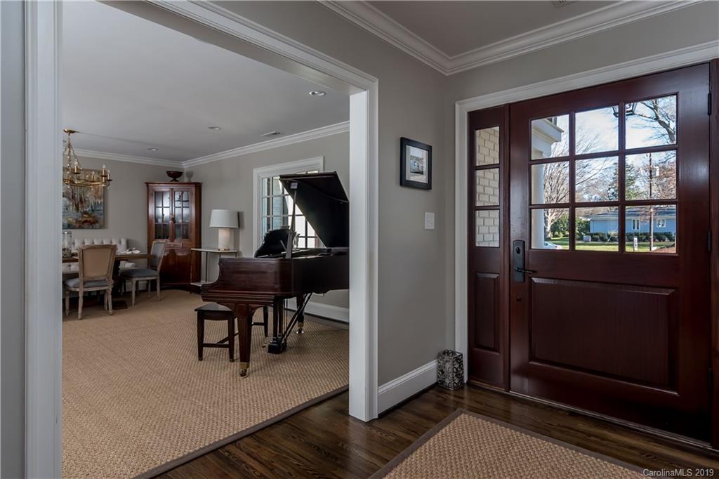 2634 Sharon Road Charlotte, NC 28211 - Photo 5 of 46 a view of a livingroom with furniture hardwood floor and workspace