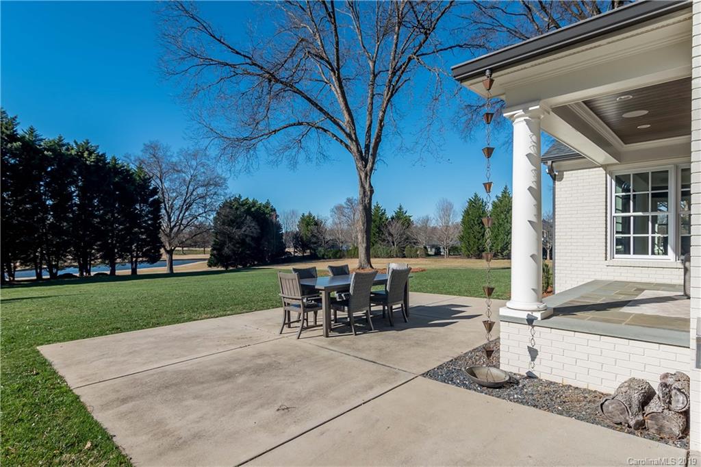 2634 Sharon Road Charlotte, NC 28211 - Photo 42 of 46 a view of a patio with a table and chairs