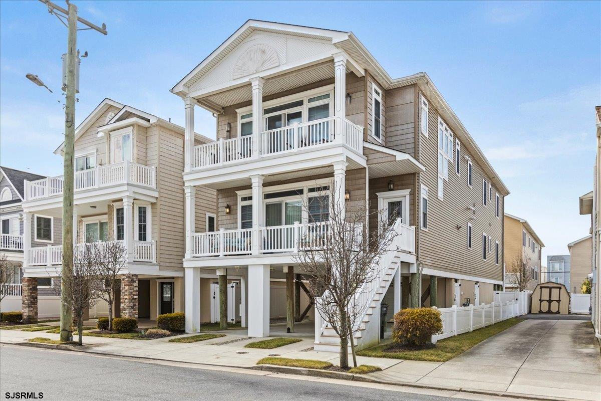 16 South Decatur Avenue Margate City, NJ 08402 - Photo 2 of 53 a front view of a building with a street