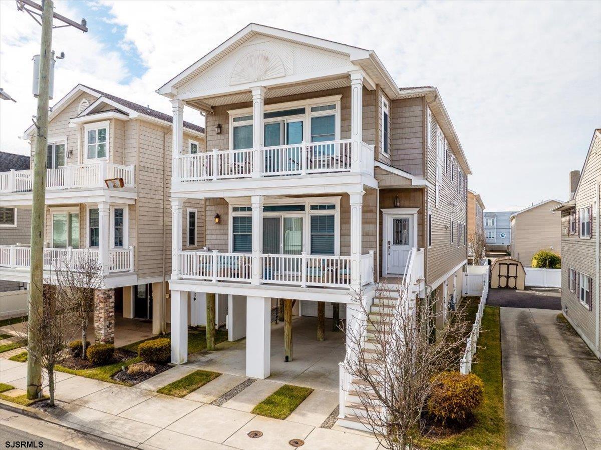16 South Decatur Avenue Margate City, NJ 08402 - Photo 47 of 53 a front view of a house with many windows