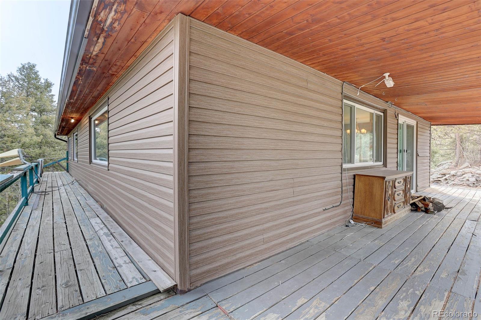 27857 Apex Circle Evergreen, CO 80439 - Photo 21 of 37 a view of a wooden deck
