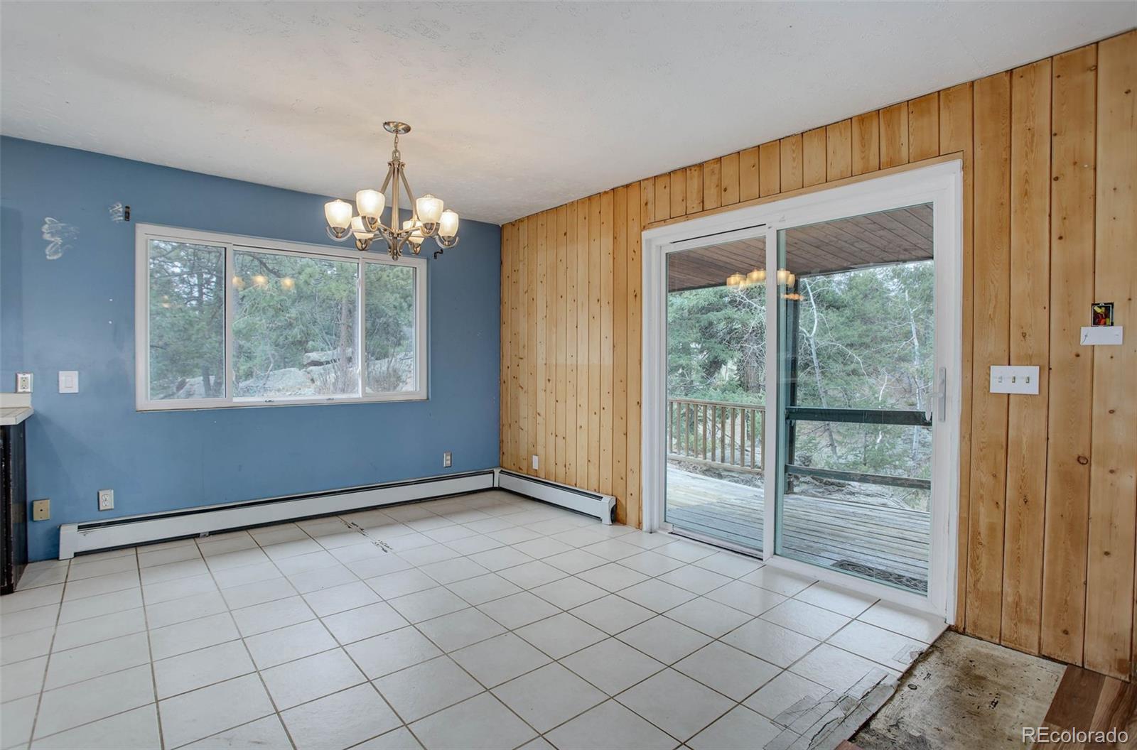 27857 Apex Circle Evergreen, CO 80439 - Photo 8 of 37 a view of an empty room with window