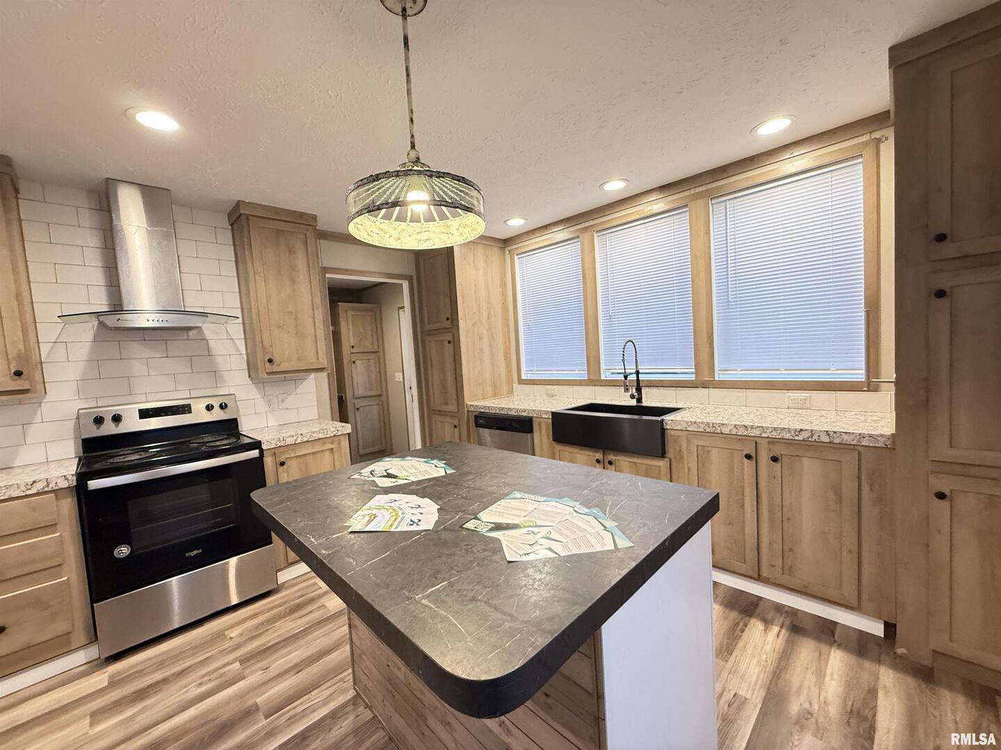 9049 Grassy Road Marion, IL 62959 - Photo 6 of 45 a kitchen with a counter space a sink and appliances