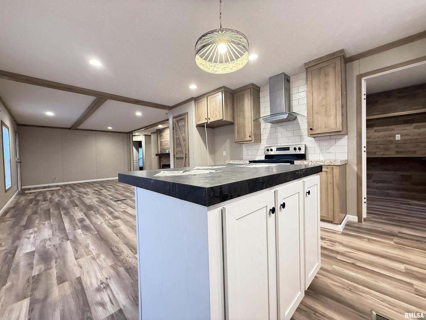 9049 Grassy Road Marion, IL 62959 - Photo 10 of 45 a kitchen with kitchen island granite countertop a sink cabinets and stainless steel appliances