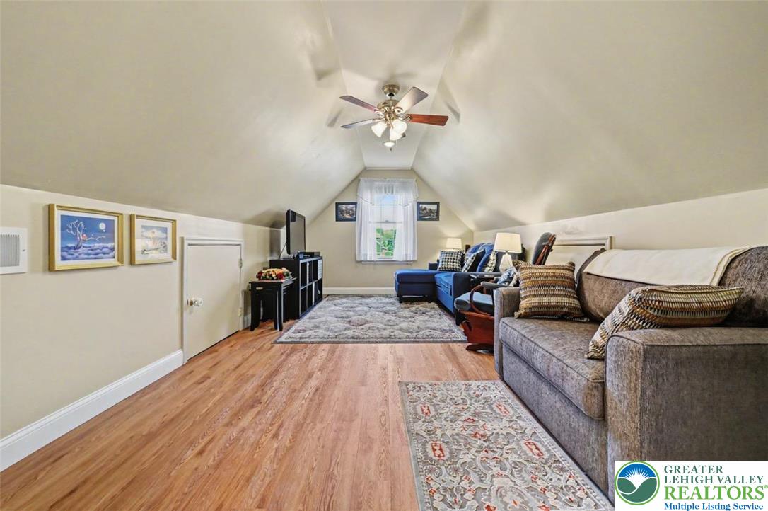 112 Michaels Run Road Stroudsburg, PA 18360 - Photo 48 of 69 The Bonus Room features LVP floors, a vaulted ceiling and a lighted fan.