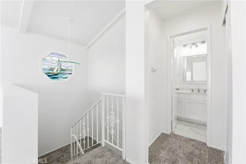 a view of entryway with bathroom