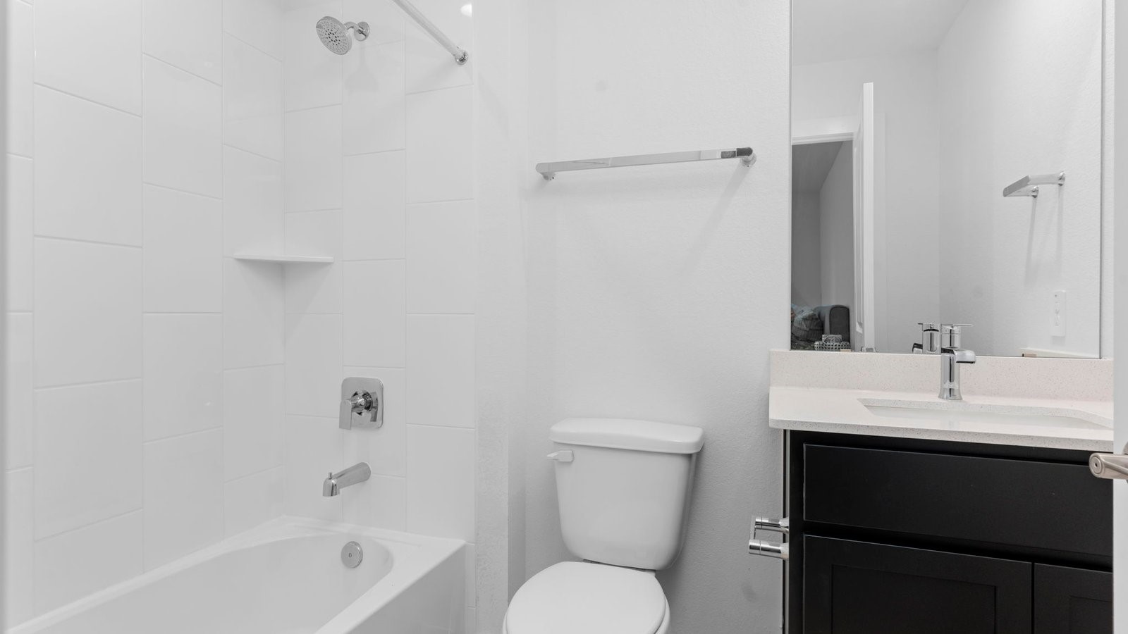 31306 Mila Cove Fulshear, TX 77441 - Photo 11 of 48 a bathroom with a sink toilet and vanity