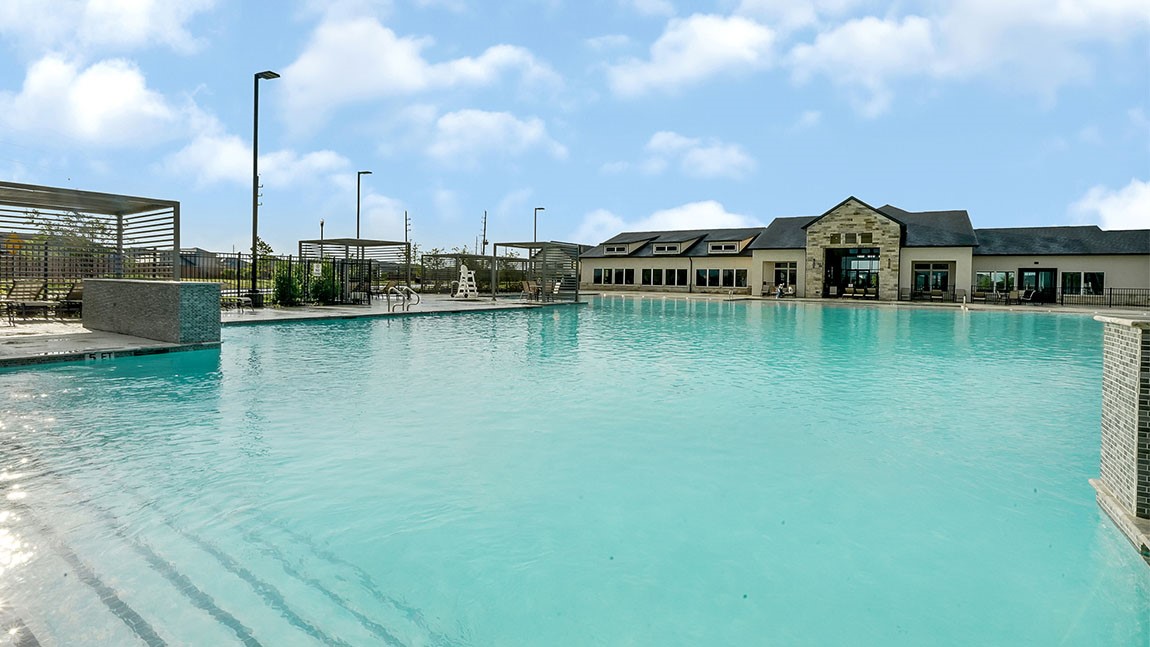 31306 Mila Cove Fulshear, TX 77441 - Photo 39 of 48 a view of a lake with houses