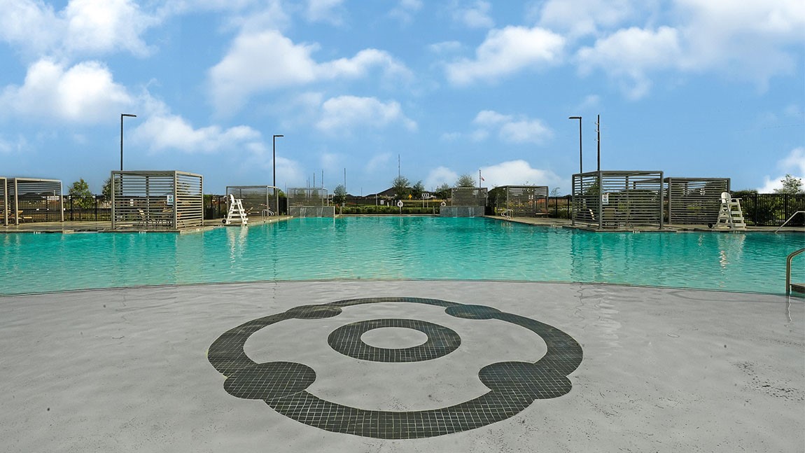 31306 Mila Cove Fulshear, TX 77441 - Photo 41 of 48 a view of a swimming pool with a lake view