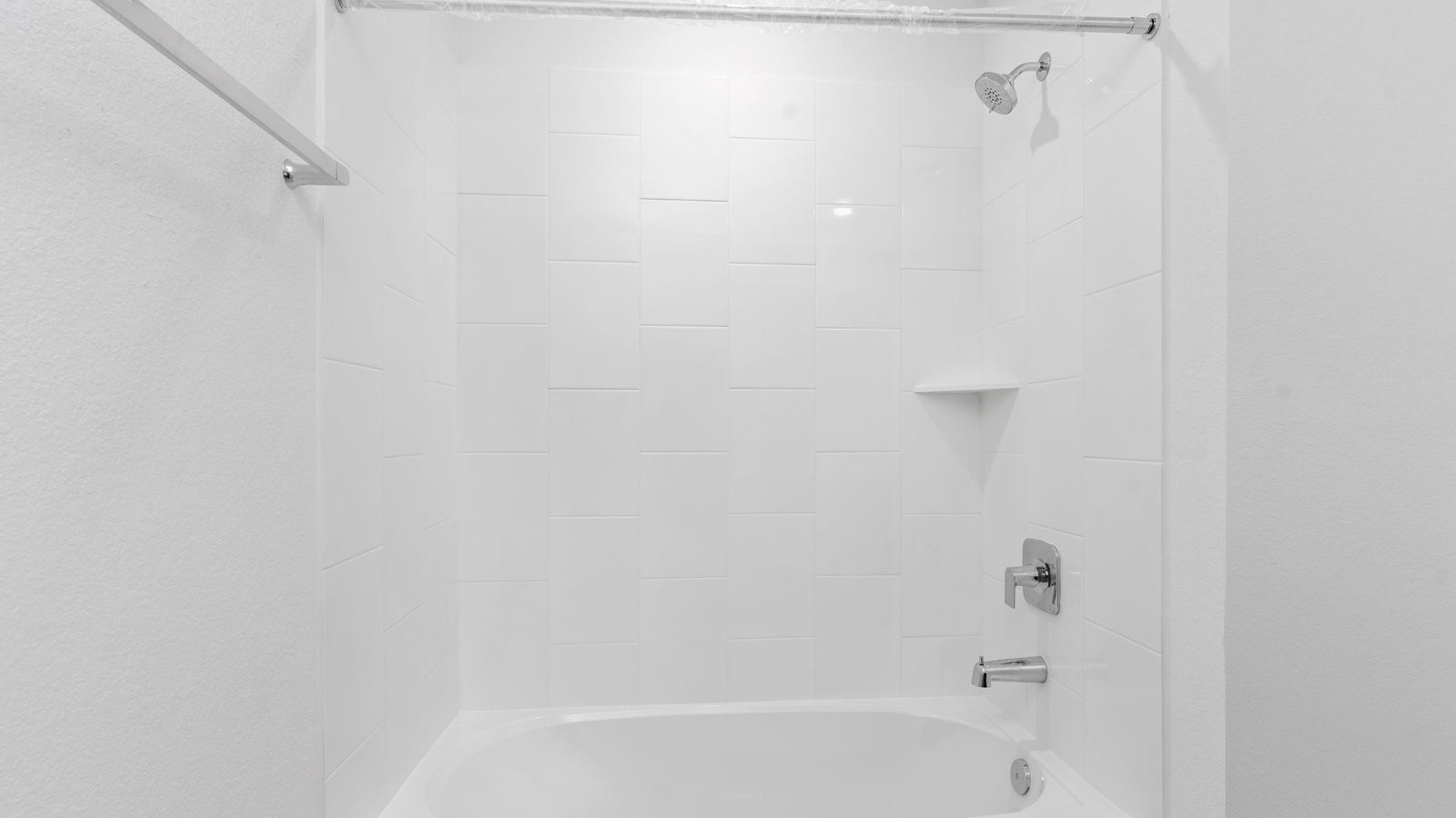 31306 Mila Cove Fulshear, TX 77441 - Photo 6 of 48 a bathroom with a bathtub