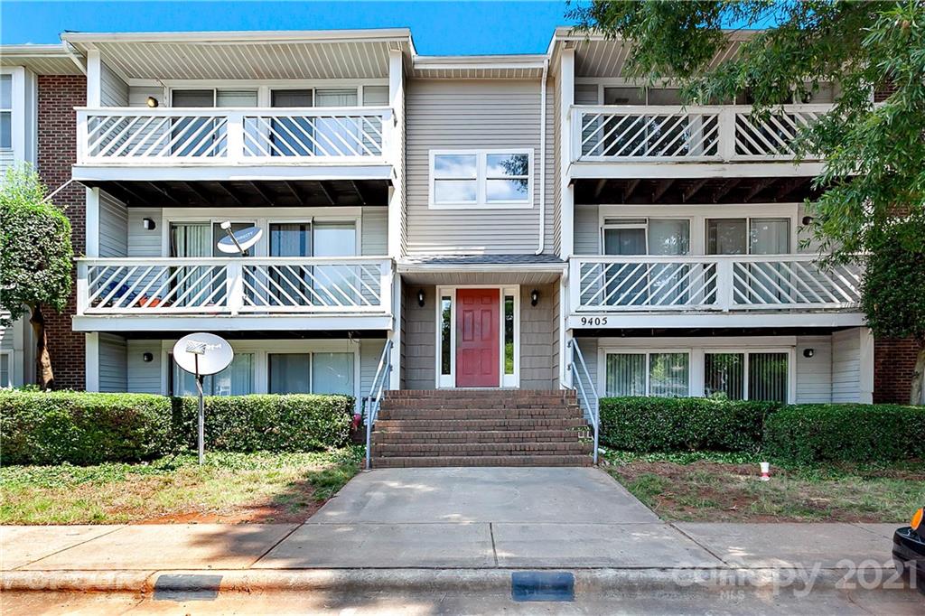 9405 Old Concord Road, Unit J Charlotte, NC 28213 - Photo 14 of 15 a view of front a house with a porch