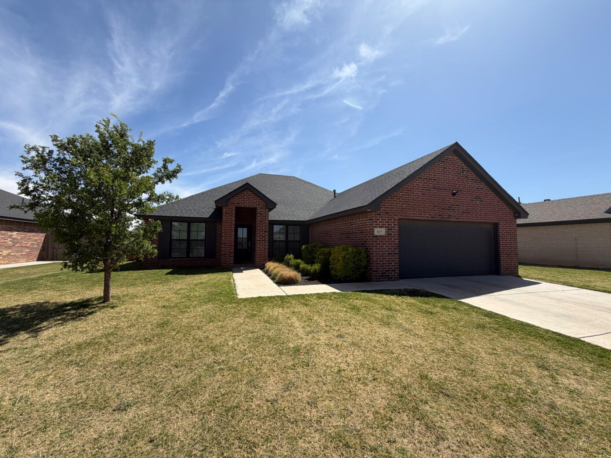 405 Ranger Street Wolfforth, TX 79382 - Photo 2 of 19 a house view with a outdoor space