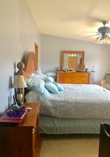 60 Mill Street Rimersburg, PA 16248 - Photo 12 of 17 a bedroom with a bed and chandelier