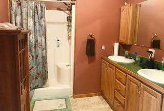 60 Mill Street Rimersburg, PA 16248 - Photo 15 of 17 a bathroom with a sink a toilet and shower