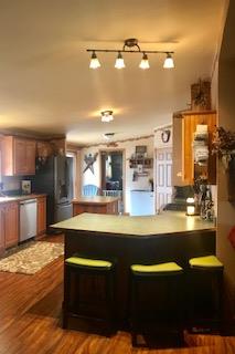 60 Mill Street Rimersburg, PA 16248 - Photo 5 of 17 a large kitchen with lots of counter space and stainless steel appliances