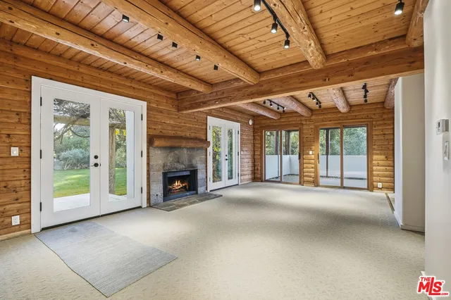 a view of a livingroom with a fireplace