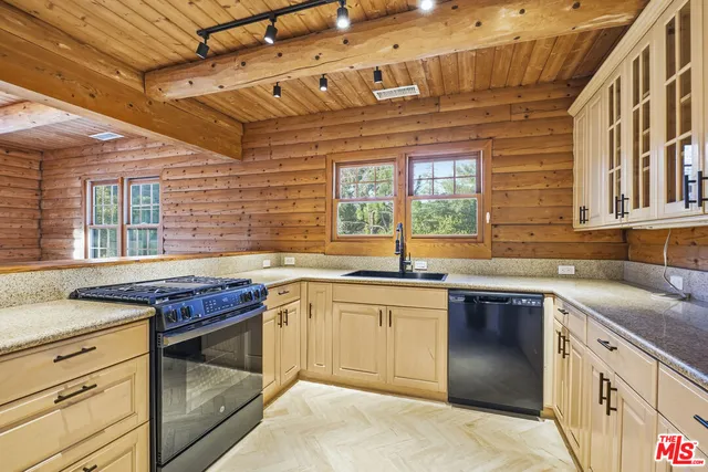a kitchen with a stove and a microwave