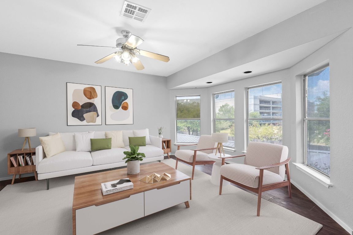 2104 Cullen Avenue, Unit 4224 Austin, TX 78757 - Photo 1 of 24 a living room with furniture and a large window
