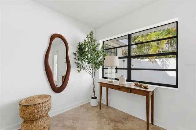 an aerial view of residential houses with outdoor space and street view