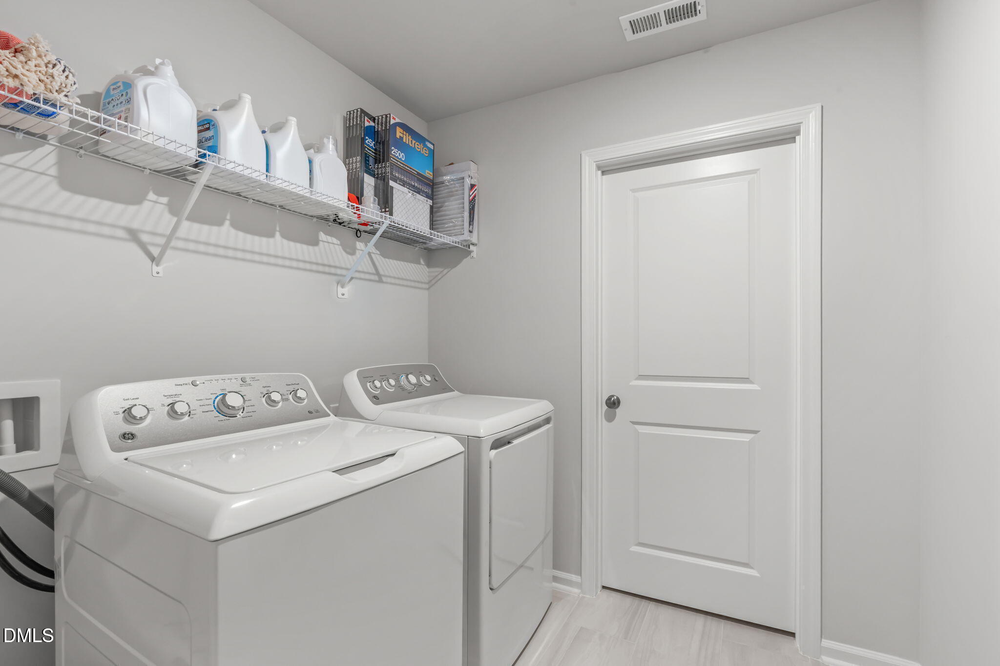 1809 Barrett Run Trail Apex, NC 27502 - Photo 20 of 23 a utility room with dryer and washer