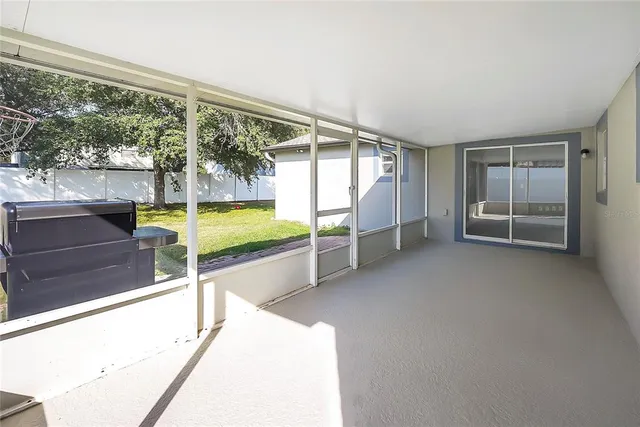 a view of an empty room with window