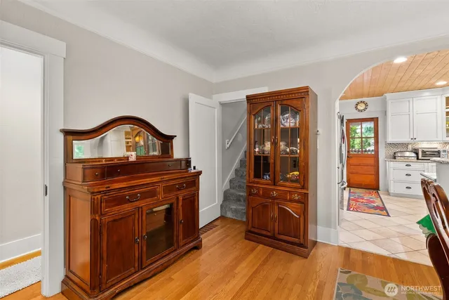 a kitchen with stainless steel appliances granite countertop a refrigerator stove and microwave