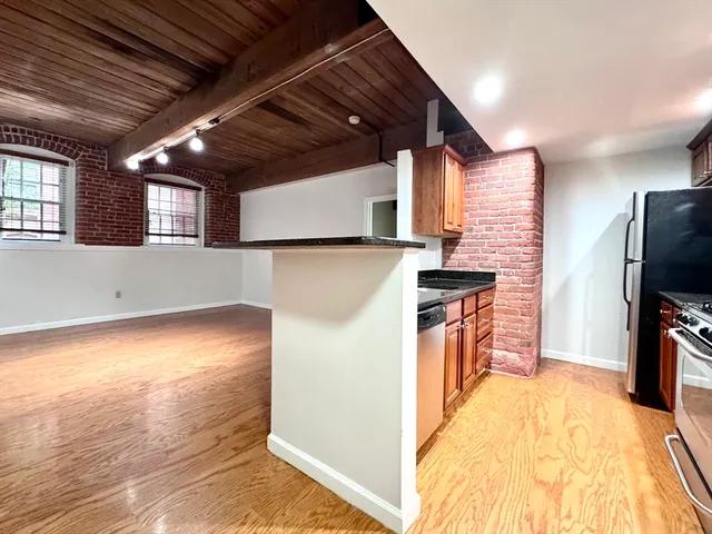 a view of a kitchen with a sink
