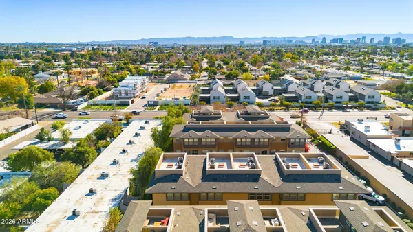 an aerial view of a city with lots of residential buildings